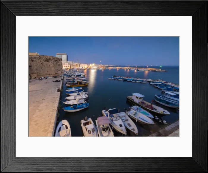 Framed Print : Dusk lights the harbor and the medieval old town of Gallipoli, Province of Lecce