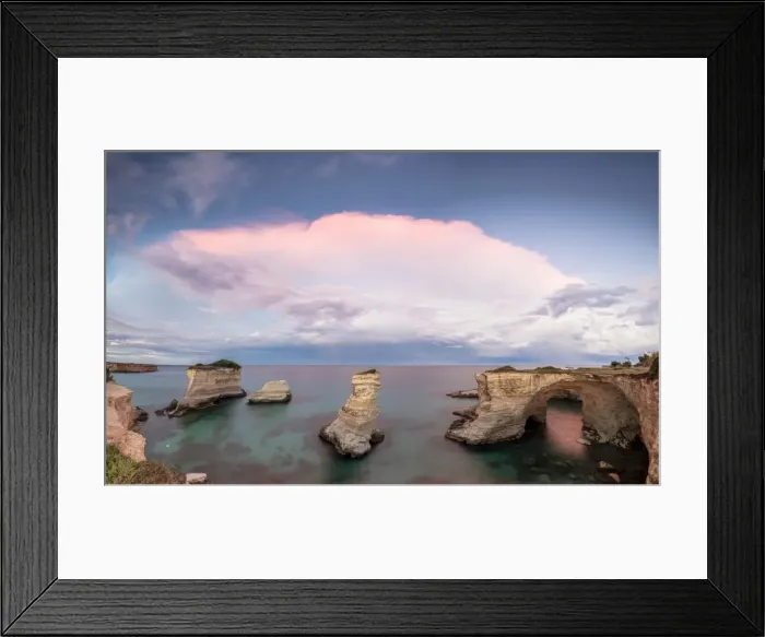Framed Print : Pink sunset frames the cliffs known as Faraglioni di Sant Andrea and the turquoise sea Framed Print : Pink sunset frames the cliffs known as Faraglioni di Sant Andrea and the turquoise sea
