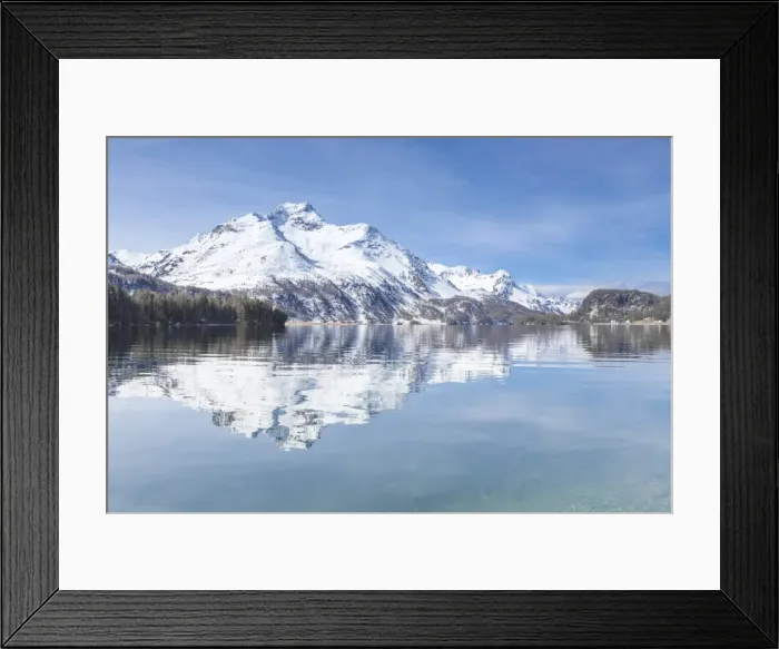 Framed Print : Snowy peaks reflected in the clear water of Lake Sils, Maloja, Canton of Graubunden Framed Print : Snowy peaks reflected in the clear water of Lake Sils, Maloja, Canton of Graubunden