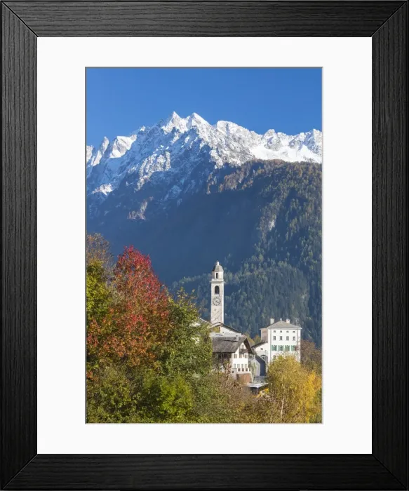 Framed Print : The colorful trees frame the alpine church and the snowy peaks, Soglio, Bregaglia Valley Framed Print : The colorful trees frame the alpine church and the snowy peaks, Soglio, Bregaglia Valley