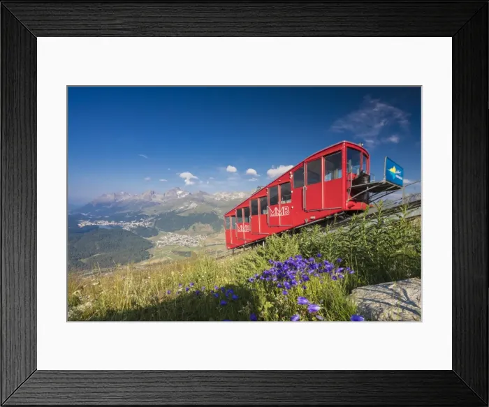Framed Print : The funicular railway runs across the alpine meadows, Muottas Muragl, Samedan, Canton of Graubunden Framed Print : The funicular railway runs across the alpine meadows, Muottas Muragl, Samedan, Canton of Graubunden