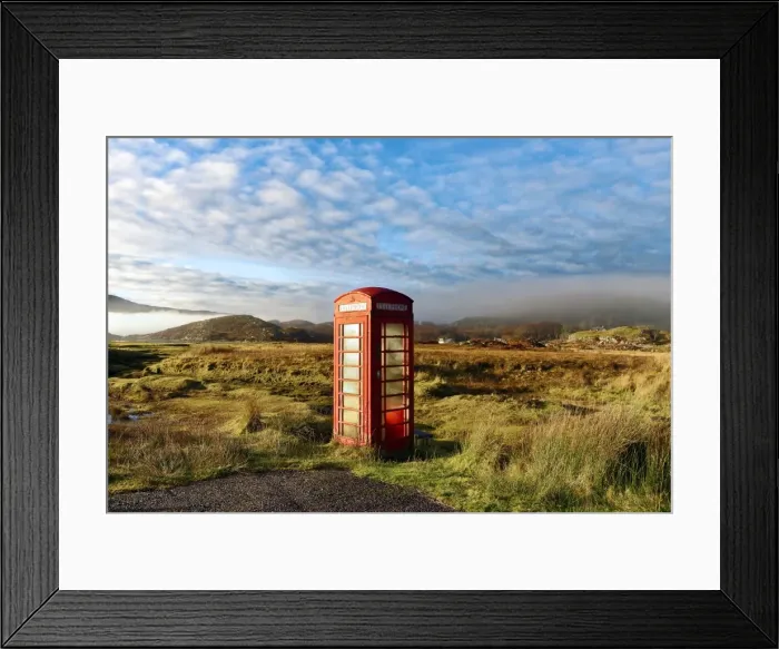 Framed Print : Autumn view of a red telephone box at the side of a quiet road in the remote misty Framed Print : Autumn view of a red telephone box at the side of a quiet road in the remote misty