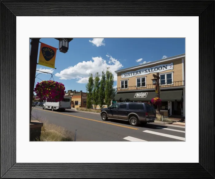 Framed Print : Cars in a traditional street in the historic City of Sisters in Deschutes County Framed Print : Cars in a traditional street in the historic City of Sisters in Deschutes County