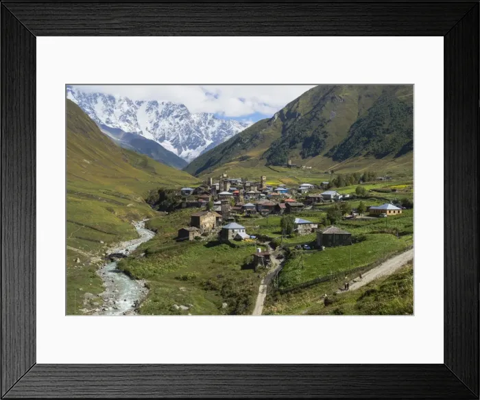 Framed Print : Traditional medieval Svanetian tower houses, Ushguli village, Shkhara Moutains behind Framed Print : Traditional medieval Svanetian tower houses, Ushguli village, Shkhara Moutains behind