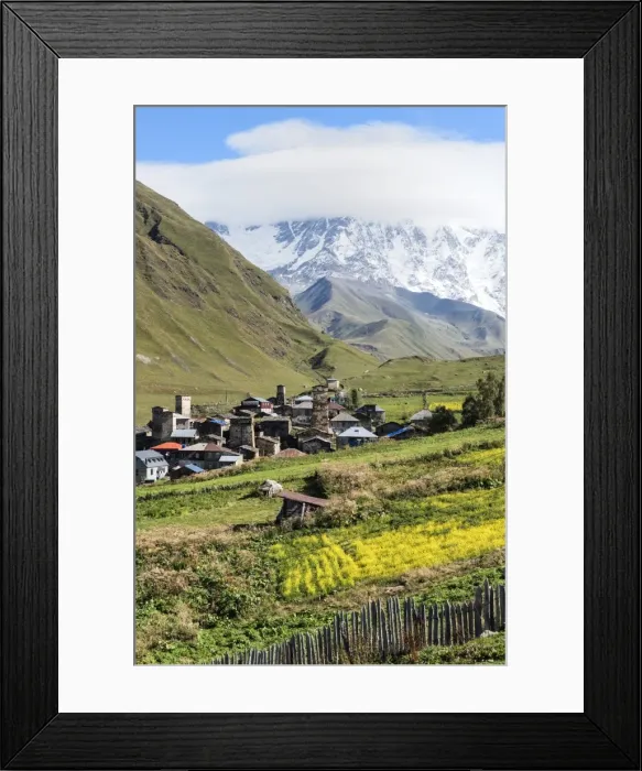 Framed Print : Traditional medieval Svanetian tower houses, Ushguli village, Shkhara Moutains behind