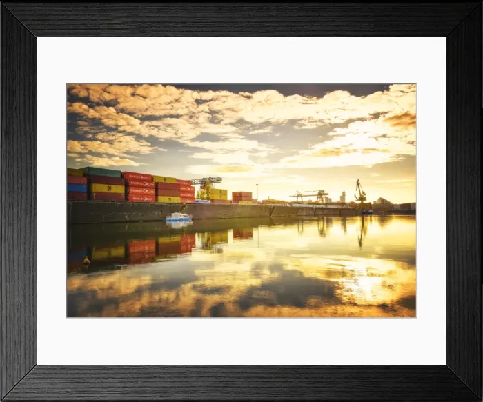 Framed Print : One of Main Rivers side channels with stacked containers and golden reflections Framed Print : One of Main Rivers side channels with stacked containers and golden reflections