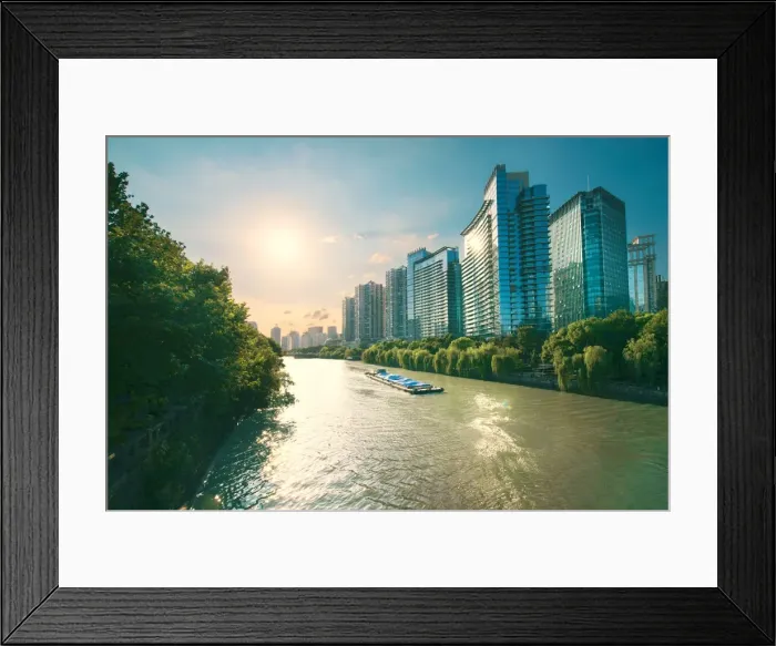 Framed Print : The Grand Canal in Hangzhou, an ancient shipping route and direct connection between Beijing Framed Print : The Grand Canal in Hangzhou, an ancient shipping route and direct connection between Beijing