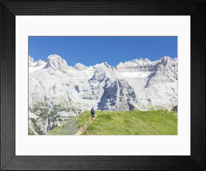 Framed Print : Hiker proceeds on the path to the rocky peaks, Doss Del Sabion, Pinzolo, Brenta Dolomites Framed Print : Hiker proceeds on the path to the rocky peaks, Doss Del Sabion, Pinzolo, Brenta Dolomites