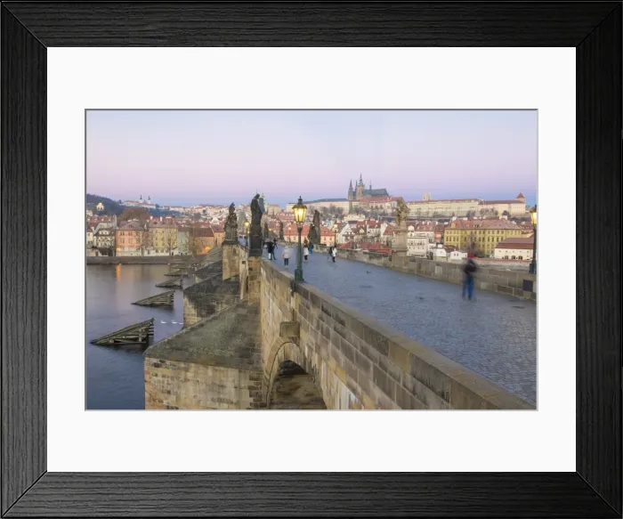 Framed Print : People on the historical Charles Bridge on Vltava River at dawn, UNESCO World Heritage Site Framed Print : People on the historical Charles Bridge on Vltava River at dawn, UNESCO World Heritage Site