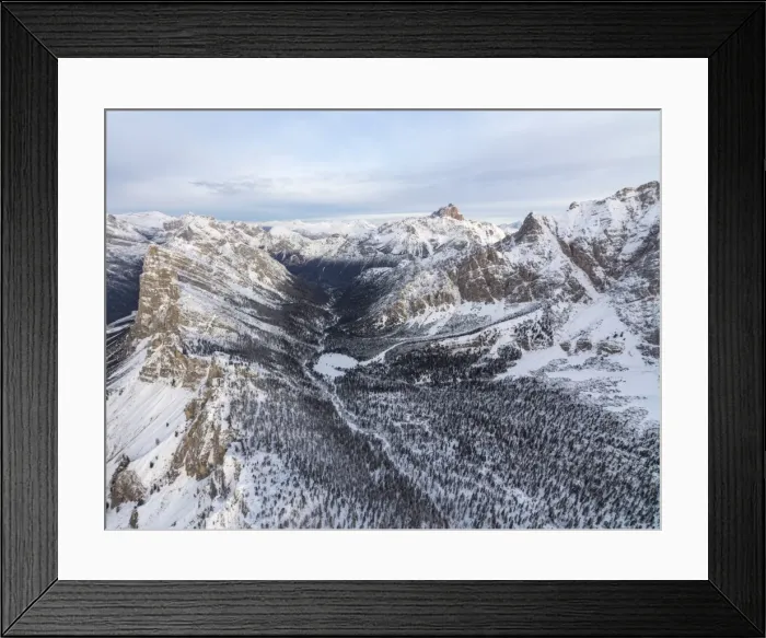 Framed Print : Aerial view of rocky peaks of Val Padeon and snowy woods, Cortina d Ampezzo, Province of Belluno Framed Print : Aerial view of rocky peaks of Val Padeon and snowy woods, Cortina d Ampezzo, Province of Belluno