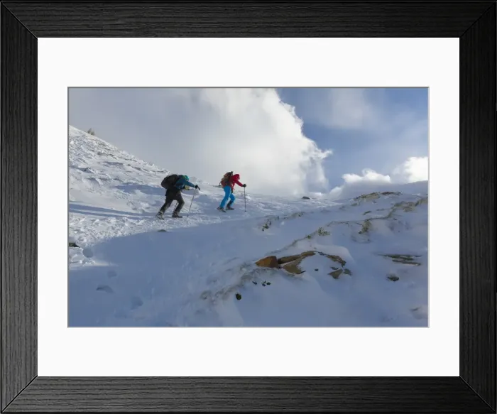 Framed Print : Hikers proceed in the snowy valley of Alpe Fora, Malenco Valley, Province of Sondrio Framed Print : Hikers proceed in the snowy valley of Alpe Fora, Malenco Valley, Province of Sondrio