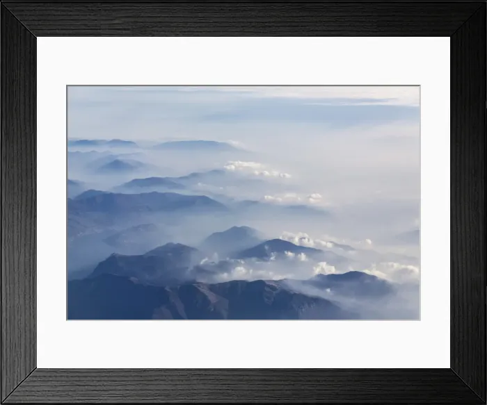 Framed Print : Aerial view of the profile of the mountain peaks surrounded by mist, Orobie Alps Framed Print : Aerial view of the profile of the mountain peaks surrounded by mist, Orobie Alps