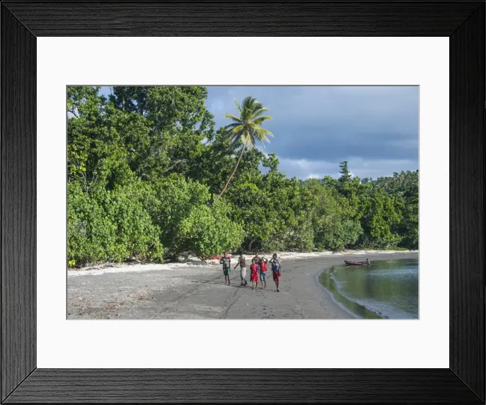 Framed Print : Local boys walking on a pretty black sand volcanic beach, Epi Island, Shepherd Islands Framed Print : Local boys walking on a pretty black sand volcanic beach, Epi Island, Shepherd Islands