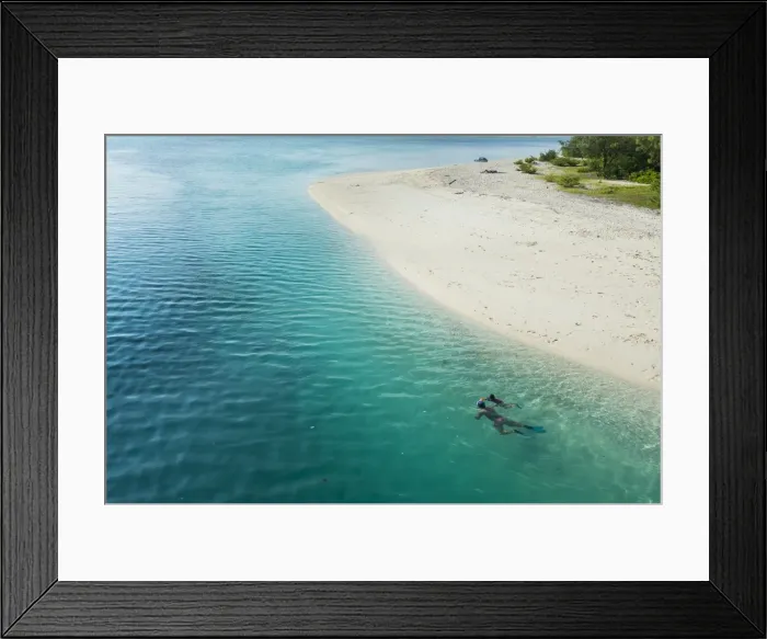 Framed Print : Man snorkeling in the beautiful lagoon of Ouvea, Loyalty Islands, New Caledonia, Pacific Framed Print : Man snorkeling in the beautiful lagoon of Ouvea, Loyalty Islands, New Caledonia, Pacific