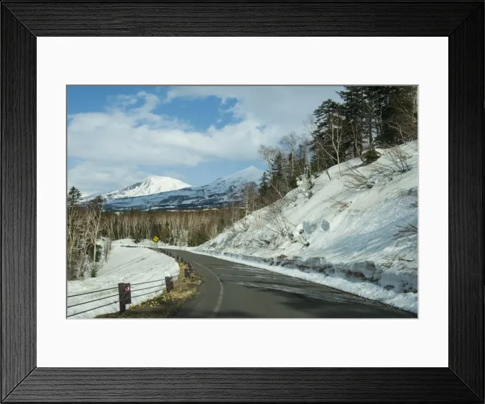 Framed Print : Road leading through the snow capped mountains of the Daisetsuzan National Park Framed Print : Road leading through the snow capped mountains of the Daisetsuzan National Park