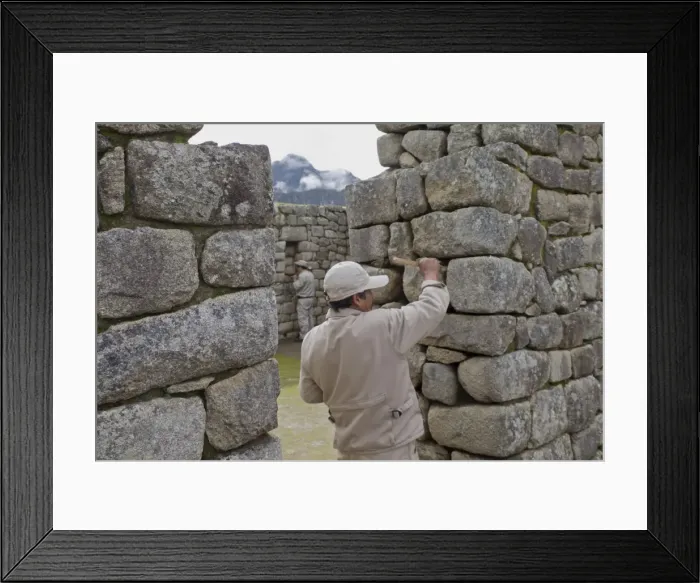 Framed Print : Restoration work at the Inca ruins of Machu Picchu, UNESCO World Heritage Site, Peru Framed Print : Restoration work at the Inca ruins of Machu Picchu, UNESCO World Heritage Site, Peru