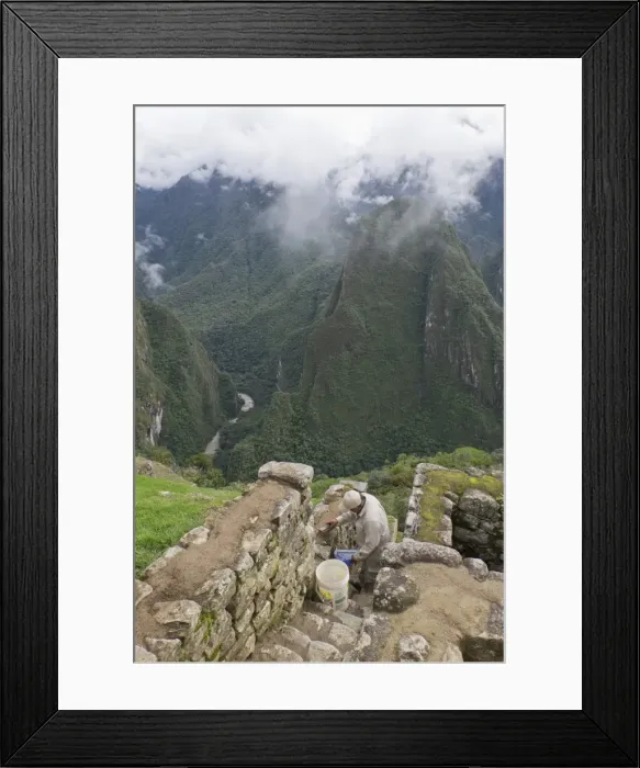Framed Print : Restoration work at the Inca ruins of Machu Picchu, UNESCO World Heritage Site, Peru Framed Print : Restoration work at the Inca ruins of Machu Picchu, UNESCO World Heritage Site, Peru