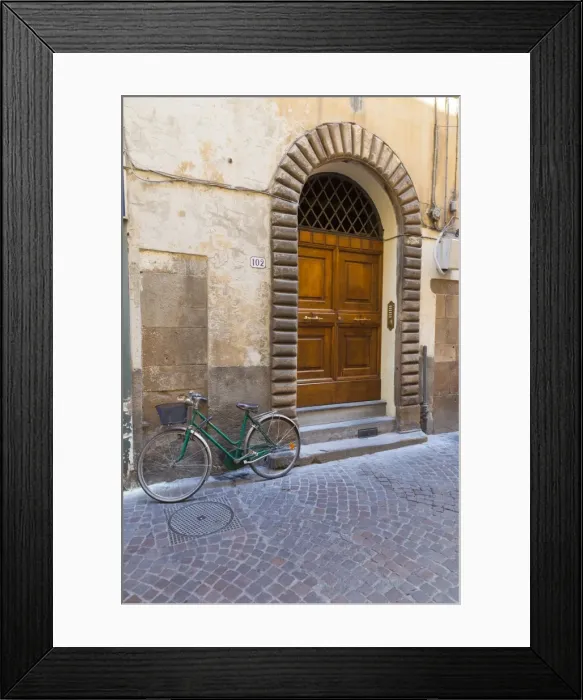 Framed Print : Bicycle parked outside front door, Lucca, Tuscany, Italy, Europe Framed Print : Bicycle parked outside front door, Lucca, Tuscany, Italy, Europe