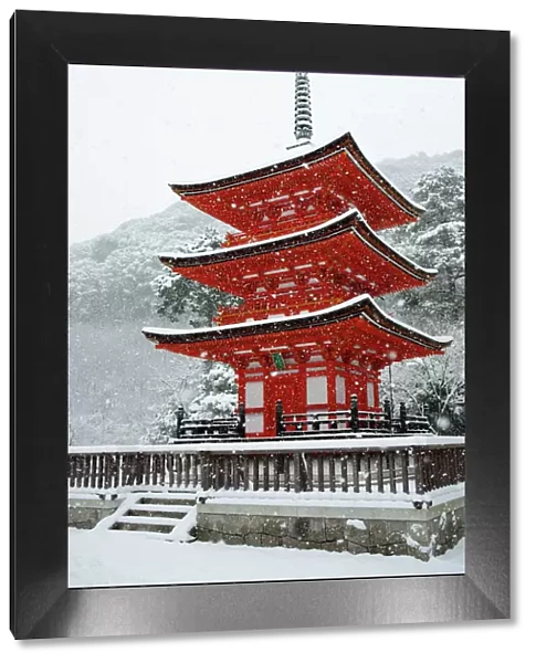 Snow falling on small red pagoda, Kiyomizu-dera Temple, UNESCO World Heritage Site
