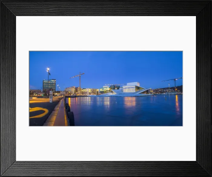 Framed Print : Night panoramic view of the Oslo Opera House, frozen bay and new business quarter Framed Print : Night panoramic view of the Oslo Opera House, frozen bay and new business quarter