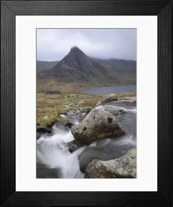 Framed Print : Water cascading down a fall on the Afon Lloer, overlooking the Ogwen Valley and Tryfan Framed Print : Water cascading down a fall on the Afon Lloer, overlooking the Ogwen Valley and Tryfan