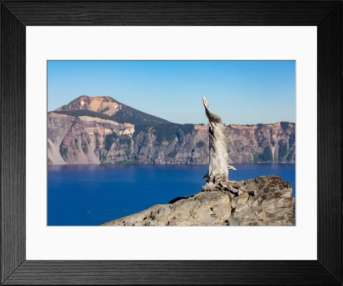 Framed Print : Lone tree trunk over Crater Lake, the deepest lake in the U. S. A. part of the Cascade Range Framed Print : Lone tree trunk over Crater Lake, the deepest lake in the U. S. A. part of the Cascade Range