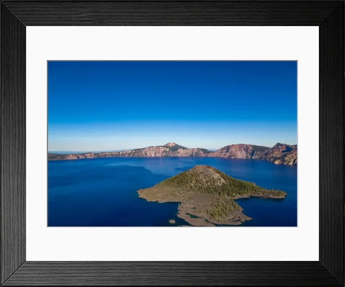 Framed Print : Wizard Island and the still waters of Crater Lake, the deepest lake in the U. S. A Framed Print : Wizard Island and the still waters of Crater Lake, the deepest lake in the U. S. A
