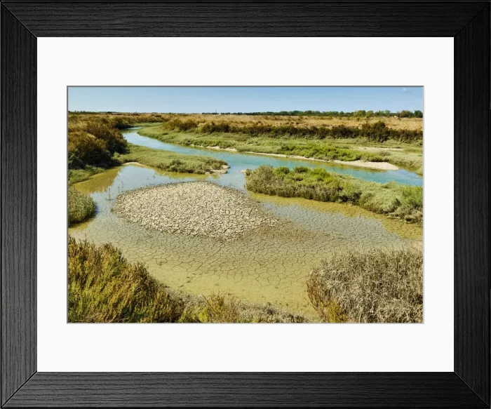 Framed Print : Waterways and cracked mud in the salt marshes of the islands west, near Le Griveau Framed Print : Waterways and cracked mud in the salt marshes of the islands west, near Le Griveau