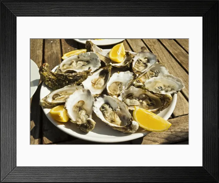 Framed Print : Oysters (huitres) ready to eat, thousands of tons of the shellfish are grown annually here Framed Print : Oysters (huitres) ready to eat, thousands of tons of the shellfish are grown annually here