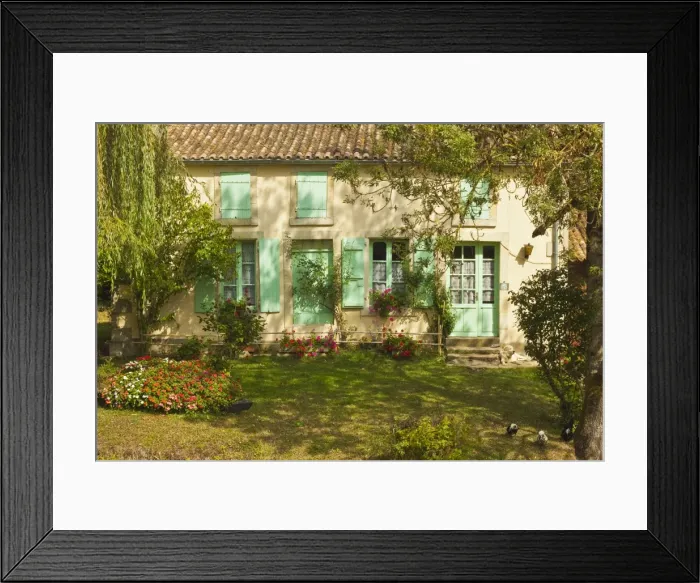 Framed Print : House with typical regional green shutters in the Marais Poitevin (Green Venice) wetlands Framed Print : House with typical regional green shutters in the Marais Poitevin (Green Venice) wetlands