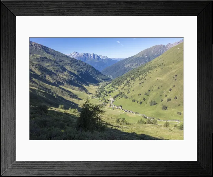 Framed Print : The typical alpine village of Case Di Viso surrounded by green meadows, Camonica Valley Framed Print : The typical alpine village of Case Di Viso surrounded by green meadows, Camonica Valley