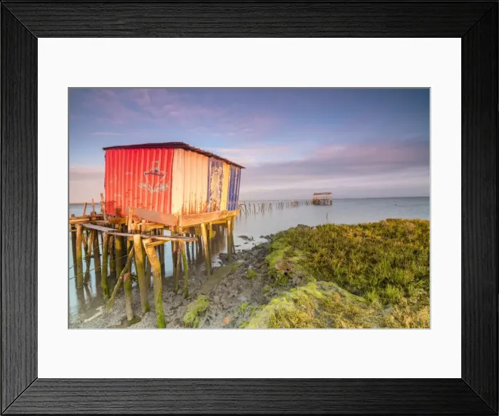 Framed Print : Pink sky at dawn on the Palafito Pier in the Carrasqueira Natural Reserve of Sado River