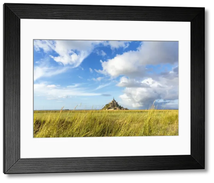 Framed Print : Clouds in the sky and grass in the foreground, Mont-Saint-Michel, UNESCO World Heritage Site Framed Print : Clouds in the sky and grass in the foreground, Mont-Saint-Michel, UNESCO World Heritage Site