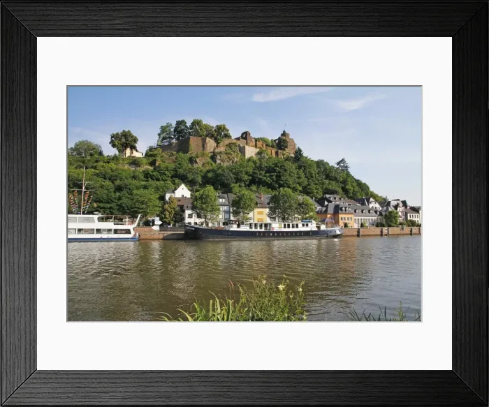 Framed Print : Tour Boats with Castle Ruin in Saarburg on Saar River, Rhineland-Palatinate, Germany Framed Print : Tour Boats with Castle Ruin in Saarburg on Saar River, Rhineland-Palatinate, Germany