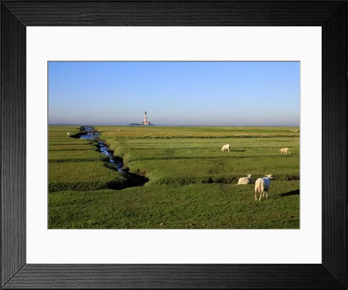 Framed Print : Lighthouse in the Wadden Sea National Park, Westerhever, Schleswig-Holstein, Germany Framed Print : Lighthouse in the Wadden Sea National Park, Westerhever, Schleswig-Holstein, Germany