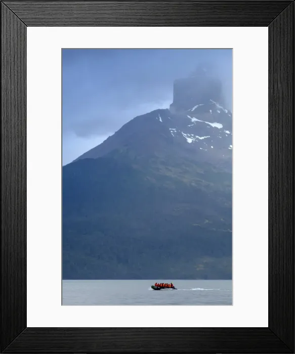 Framed Print : Dingy in a fjord in Alberto de Agostini National Park with the Darwin mountain range Framed Print : Dingy in a fjord in Alberto de Agostini National Park with the Darwin mountain range