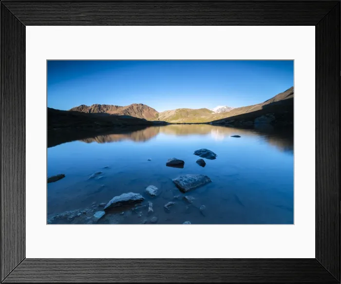 Framed Print : The rocky peaks reflected in Lake Umbrail at sunset, Stelvio Pass, Valtellina, Lombardy Framed Print : The rocky peaks reflected in Lake Umbrail at sunset, Stelvio Pass, Valtellina, Lombardy