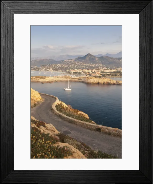 Framed Print : A sail boat in the clear sea around the village of Ile Rousse at sunset, Balagne Region Framed Print : A sail boat in the clear sea around the village of Ile Rousse at sunset, Balagne Region