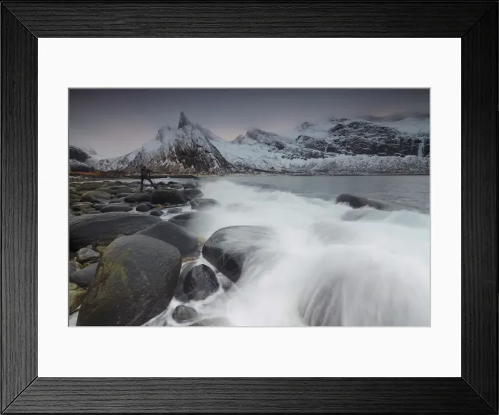 Framed Print : Photographer on the rocks surrounded by snowy peaks and waves of the cold sea, Senja Framed Print : Photographer on the rocks surrounded by snowy peaks and waves of the cold sea, Senja