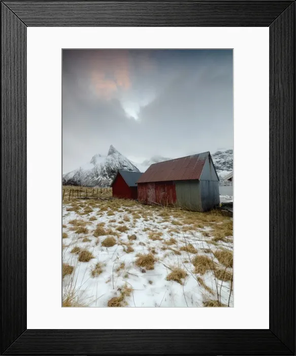 Framed Print : Clouds on snowy peaks above typical wooden hut called Rorbu, Senja, Ersfjord, Troms county Framed Print : Clouds on snowy peaks above typical wooden hut called Rorbu, Senja, Ersfjord, Troms county