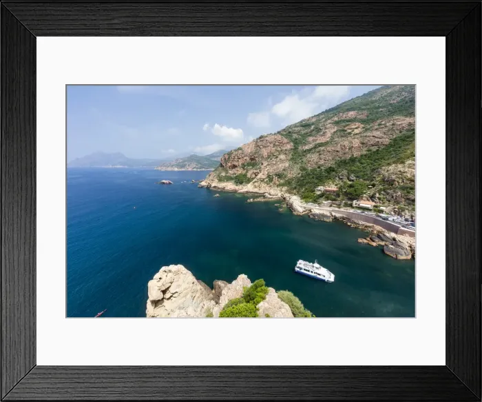 Framed Print : Tourist boat in the turquoise sea framed by limestone cliffs, Porto, Southern Corsica Framed Print : Tourist boat in the turquoise sea framed by limestone cliffs, Porto, Southern Corsica