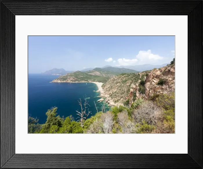 Framed Print : Top view of turquoise sea and sandy beach framed by green vegetation on the promontory Framed Print : Top view of turquoise sea and sandy beach framed by green vegetation on the promontory
