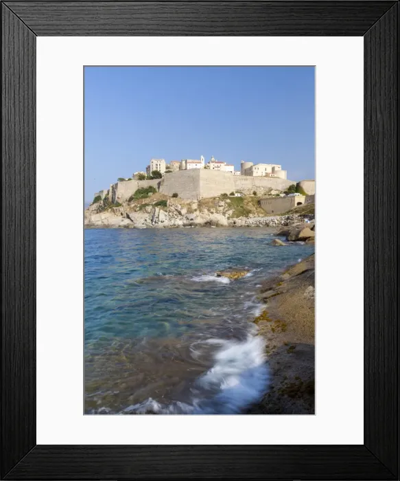Framed Print : The old fortified citadel on the promontory surrounded by the clear sea, Calvi, Balagne Region