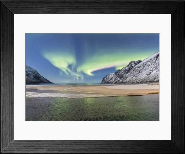 Framed Print : Green lights of Northern Lights (aurora borealis) reflected in the cold sea surrounded Framed Print : Green lights of Northern Lights (aurora borealis) reflected in the cold sea surrounded