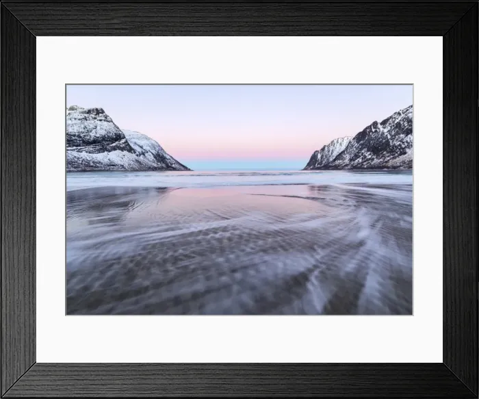 Framed Print : The pink light of sunrise over the waves of frozen sea surrounded by snowy peaks Framed Print : The pink light of sunrise over the waves of frozen sea surrounded by snowy peaks