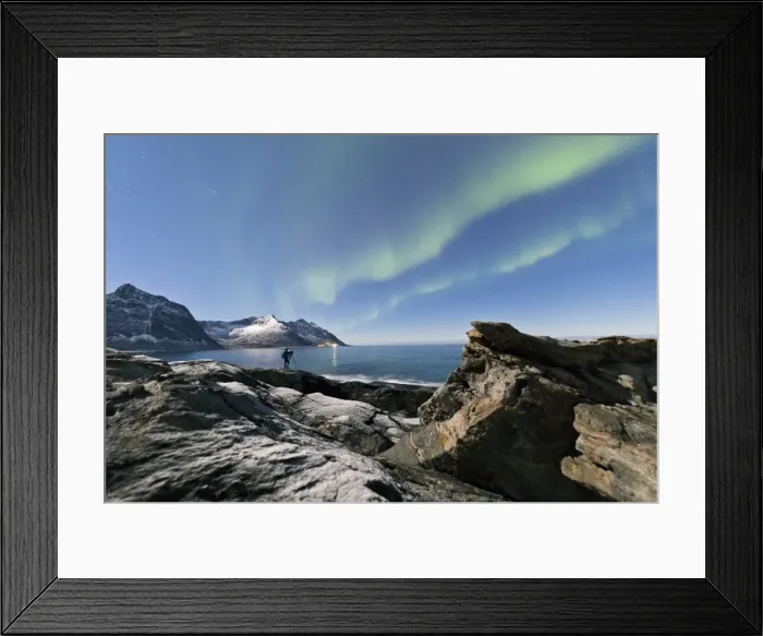 Framed Print : Photographer under the stars and Northern Lights (aurora borealis) surrounded by rocky peaks Framed Print : Photographer under the stars and Northern Lights (aurora borealis) surrounded by rocky peaks