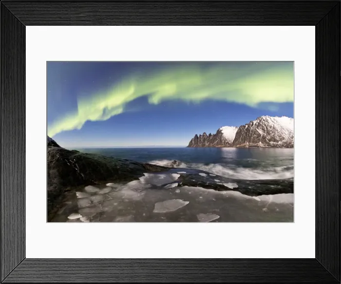 Framed Print : Panorama of frozen sea and rocky peaks illuminated by the Northern Lights (aurora borealis) Framed Print : Panorama of frozen sea and rocky peaks illuminated by the Northern Lights (aurora borealis)