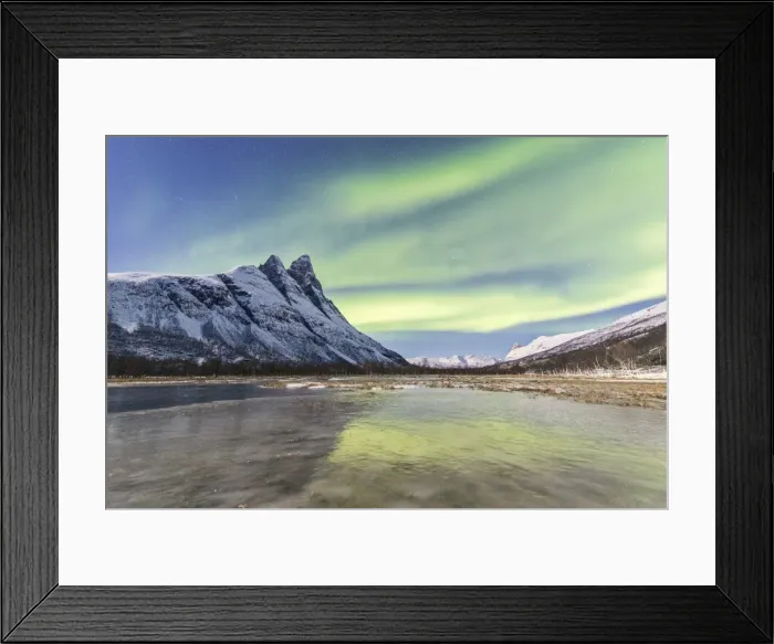 Framed Print : The snowy peak of Otertinden and the Northern Lights (aurora borealis) in the polar night Framed Print : The snowy peak of Otertinden and the Northern Lights (aurora borealis) in the polar night