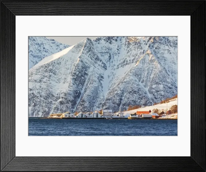 Framed Print : The typical fishing village of Hamnes framed by snowy peaks and the cold sea, Lyngen Alps Framed Print : The typical fishing village of Hamnes framed by snowy peaks and the cold sea, Lyngen Alps