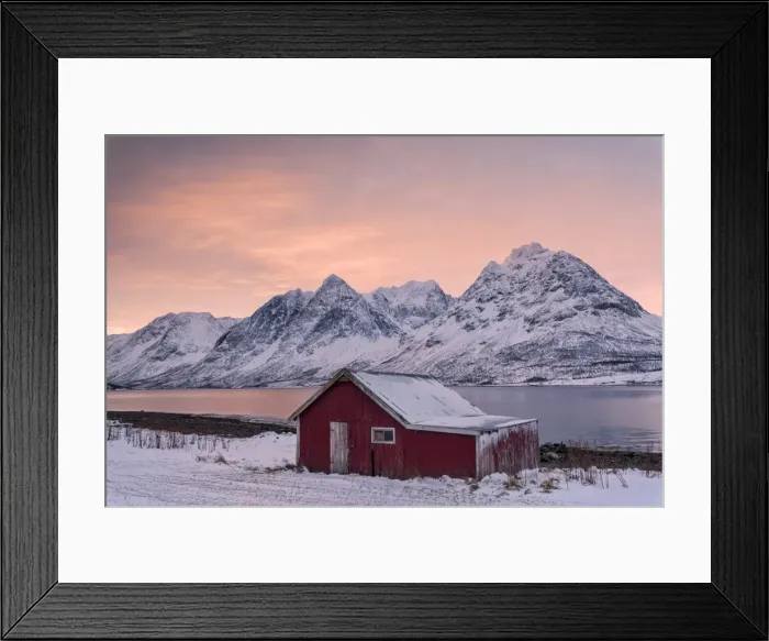Framed Print : Pink clouds at dawn on the wooden hut surrounded by frozen sea and snowy peaks, Svensby Framed Print : Pink clouds at dawn on the wooden hut surrounded by frozen sea and snowy peaks, Svensby